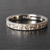 platinum wedding band with roses and scroll pattern web