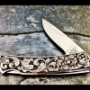 buck-folding-pocketknife-hand-engraved-american-scroll-web